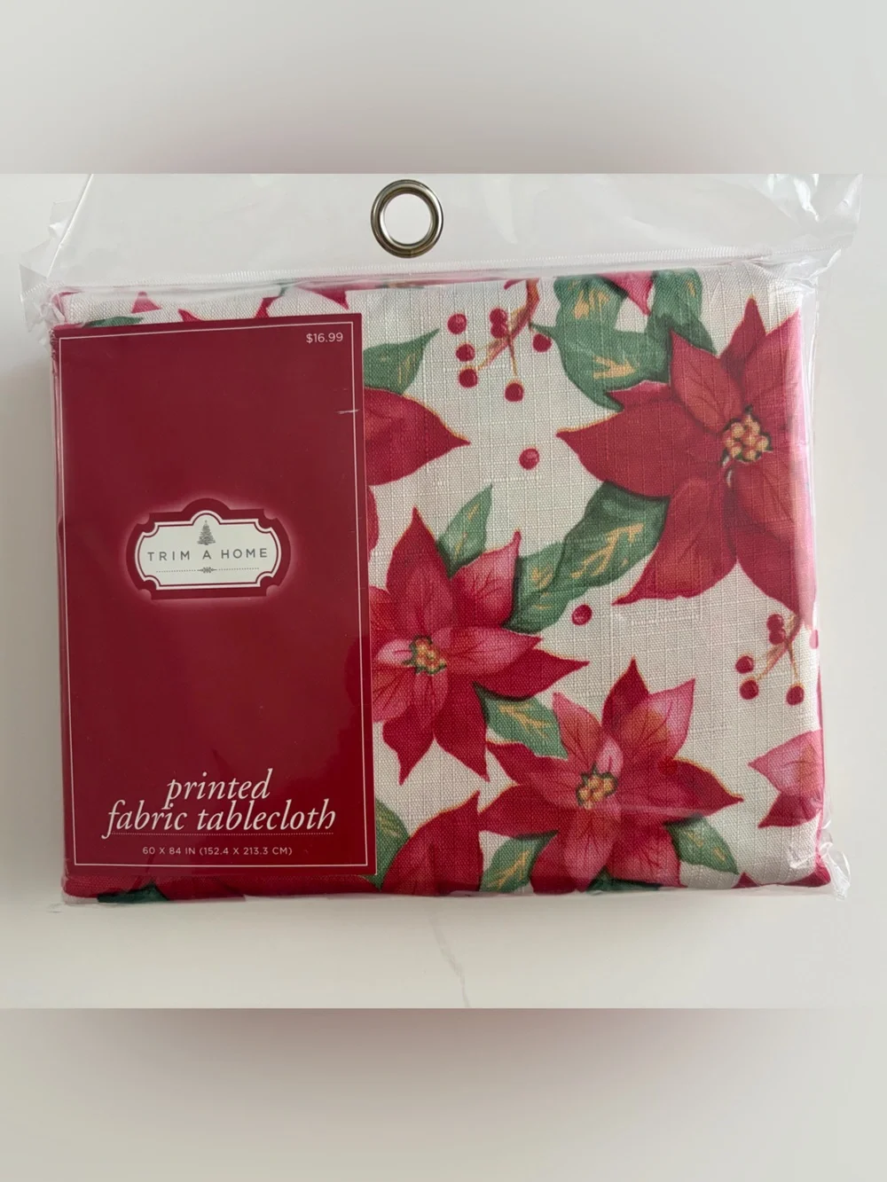 NWT Christmas print fabric tablecloth. 60x84 oblong. Original packaging